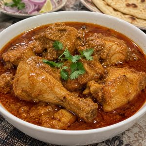 Delicious Chicken Shahi Qorma with tender chicken, rich creamy gravy, and aromatic traditional spices from www.paknpure.com.
